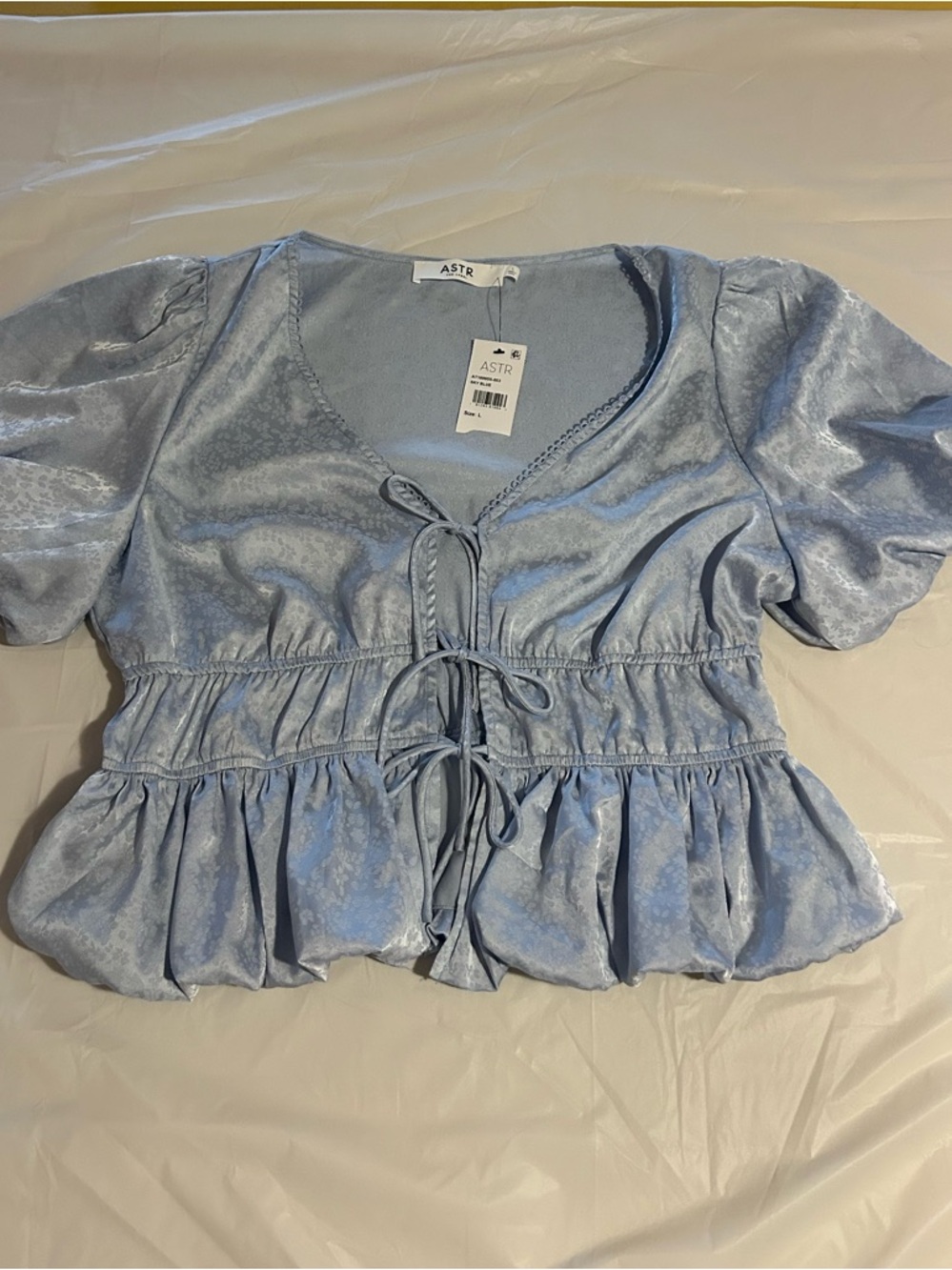 Astr Light Blue Puff-Sleeve Tie-Front Peplum Blouse